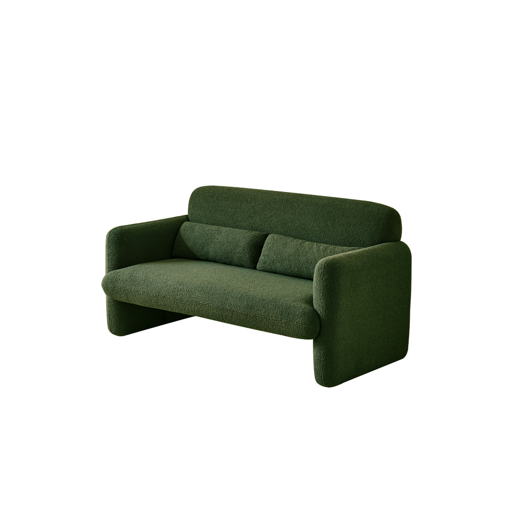 A fsid view of feorest green two-seater sofa with a minimalist design, featuring a low profile and sleek silhouette, made with synthetic lambswool upholstery.