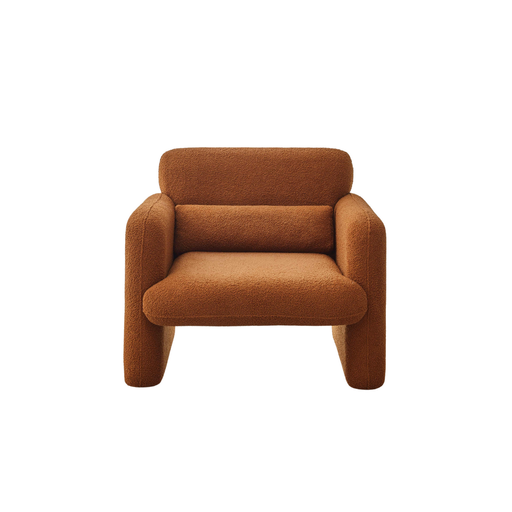 An image featuring an amber-coloured armchair with a minimalist design, showing its back, seat, and side panels.