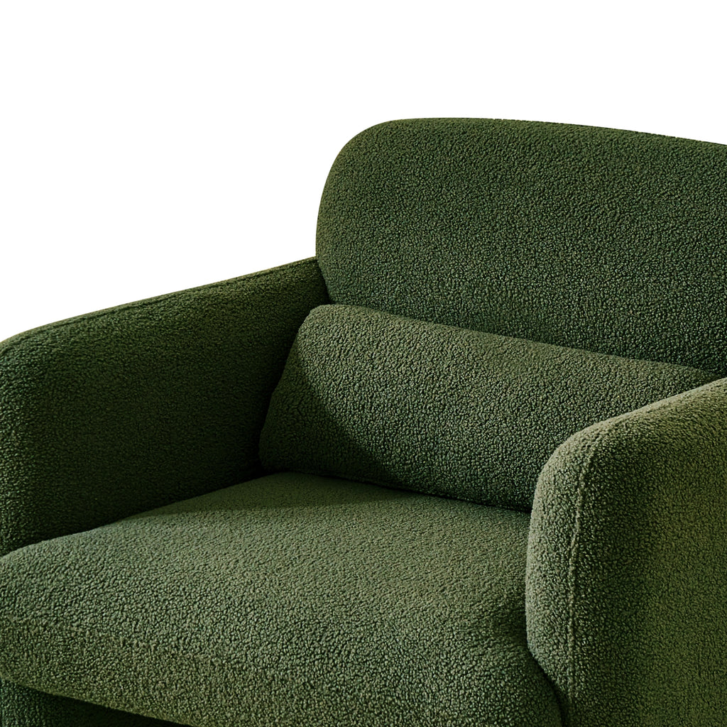A close-up image featuring a forest green armchair with a minimalist design
