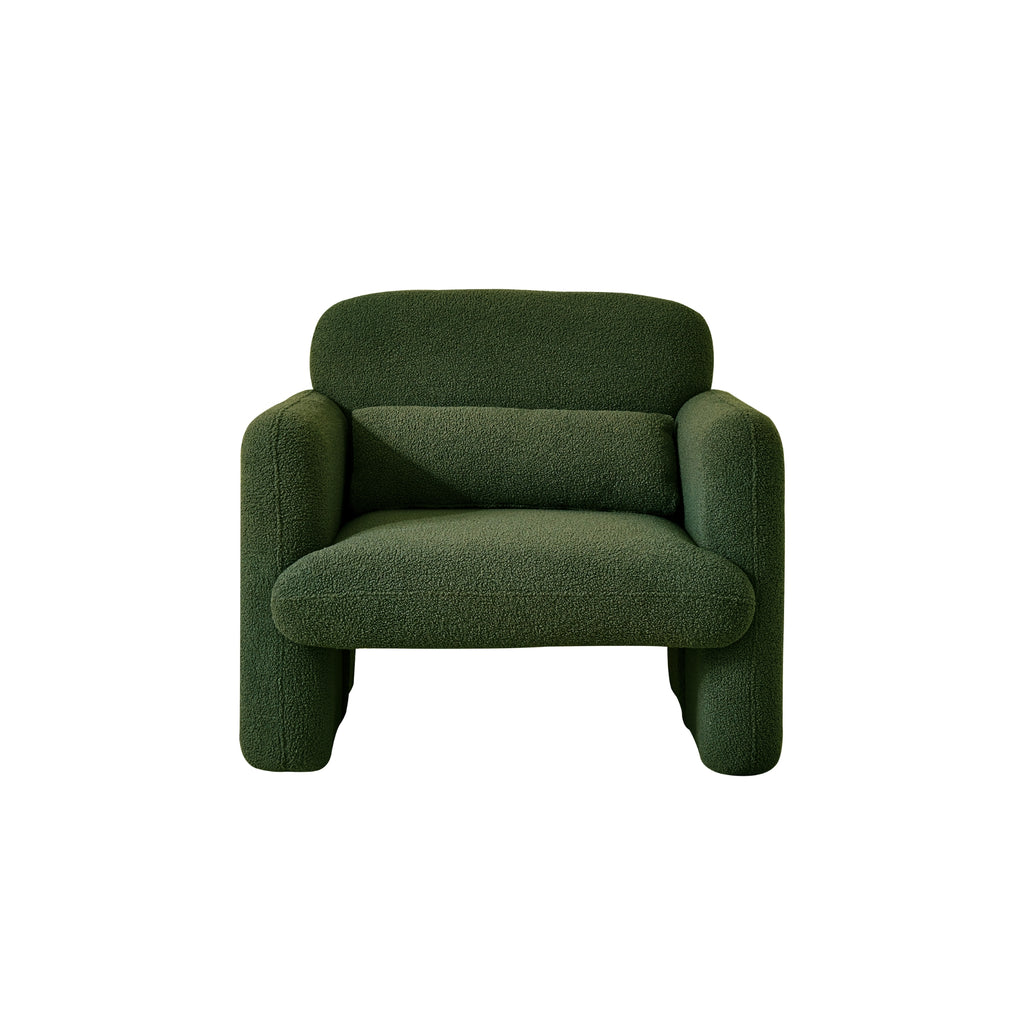 An image featuring a forest green armchair with a minimalist design, showing its profile with a focus on its shape and colour.