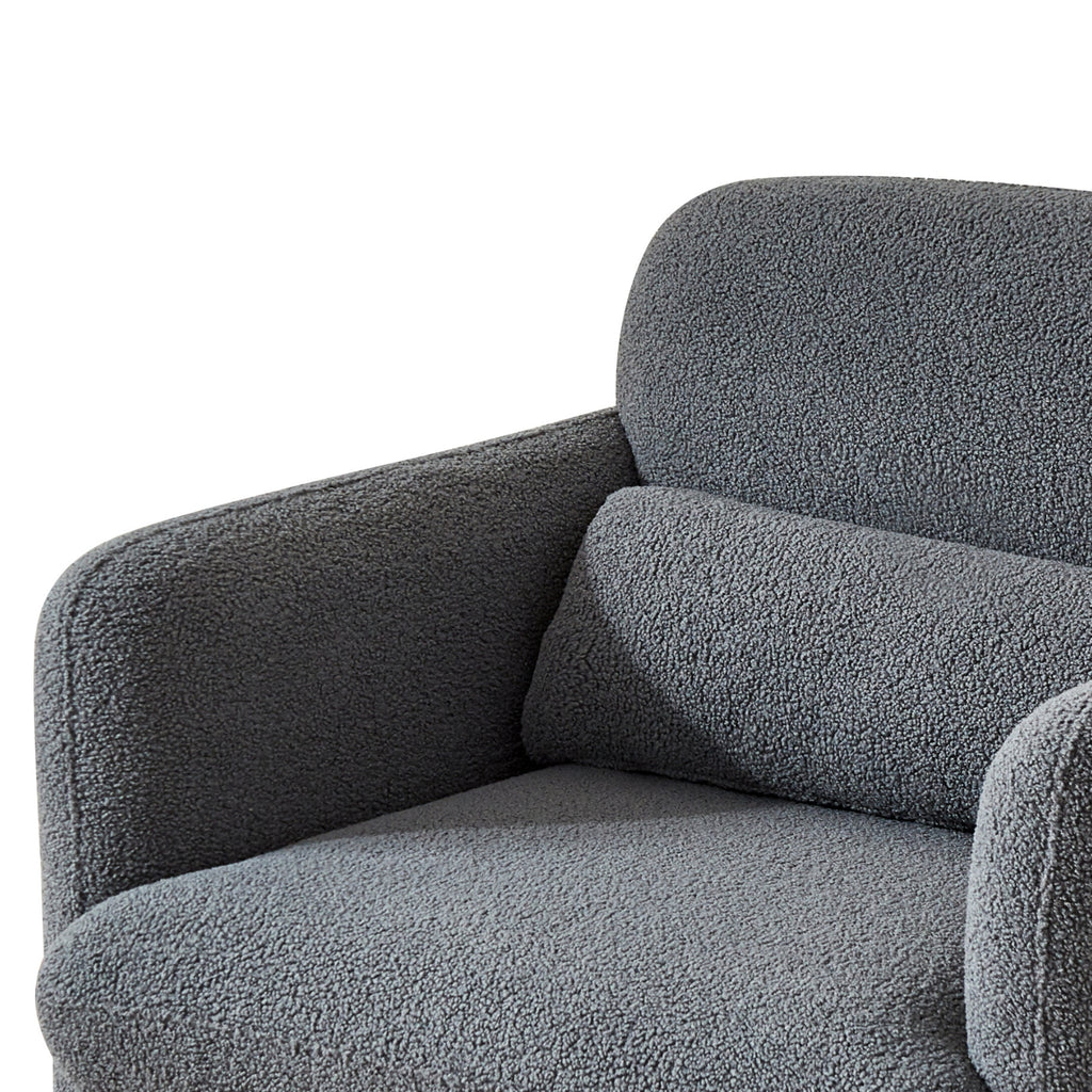 A grey upholstered Astrid Armchair with a minimalist design.
