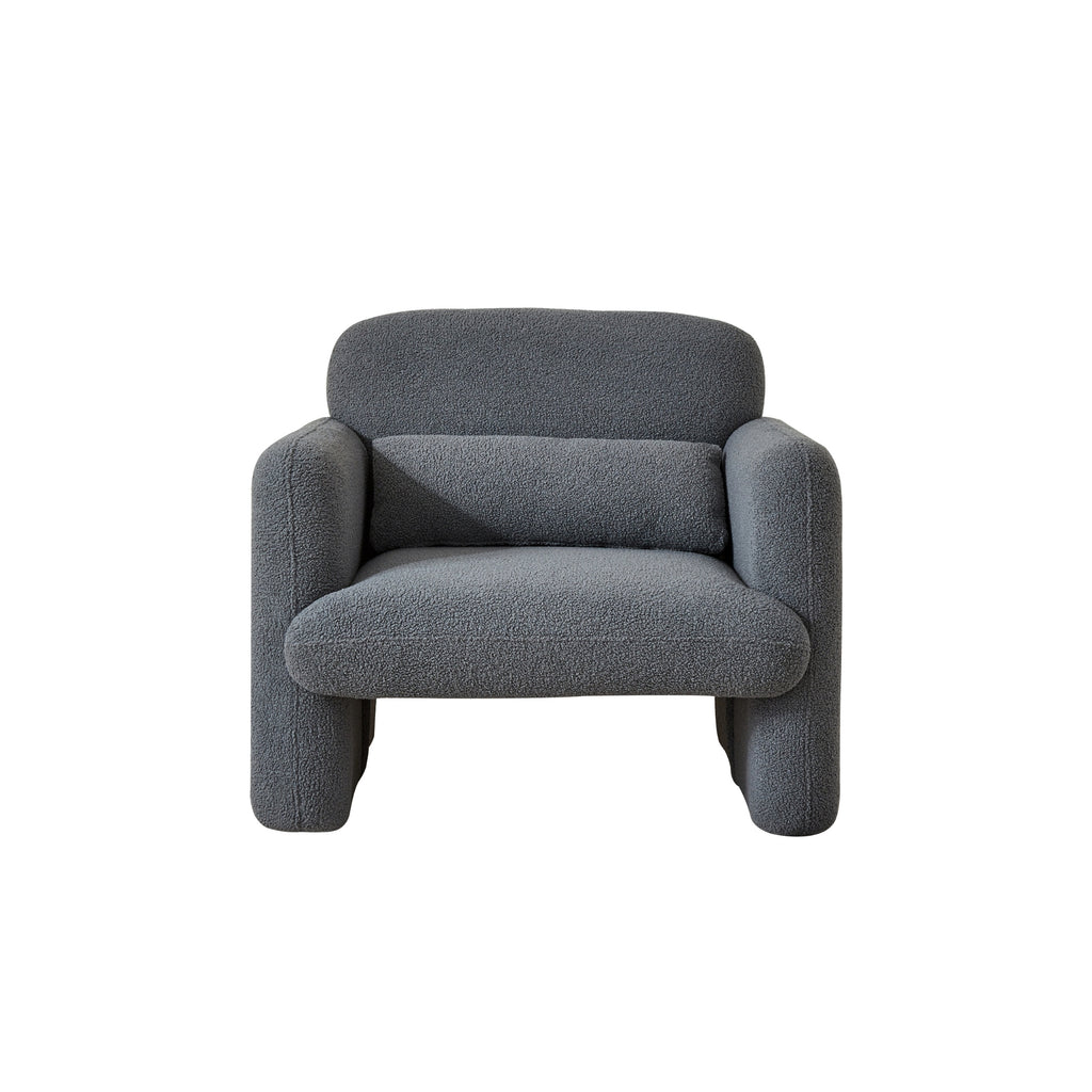 An image featuring a grey armchair with a minimalist design