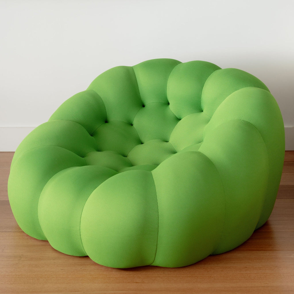 Cosmo Sofa photos green buttoned sofa on a wooden floor with a white wall 