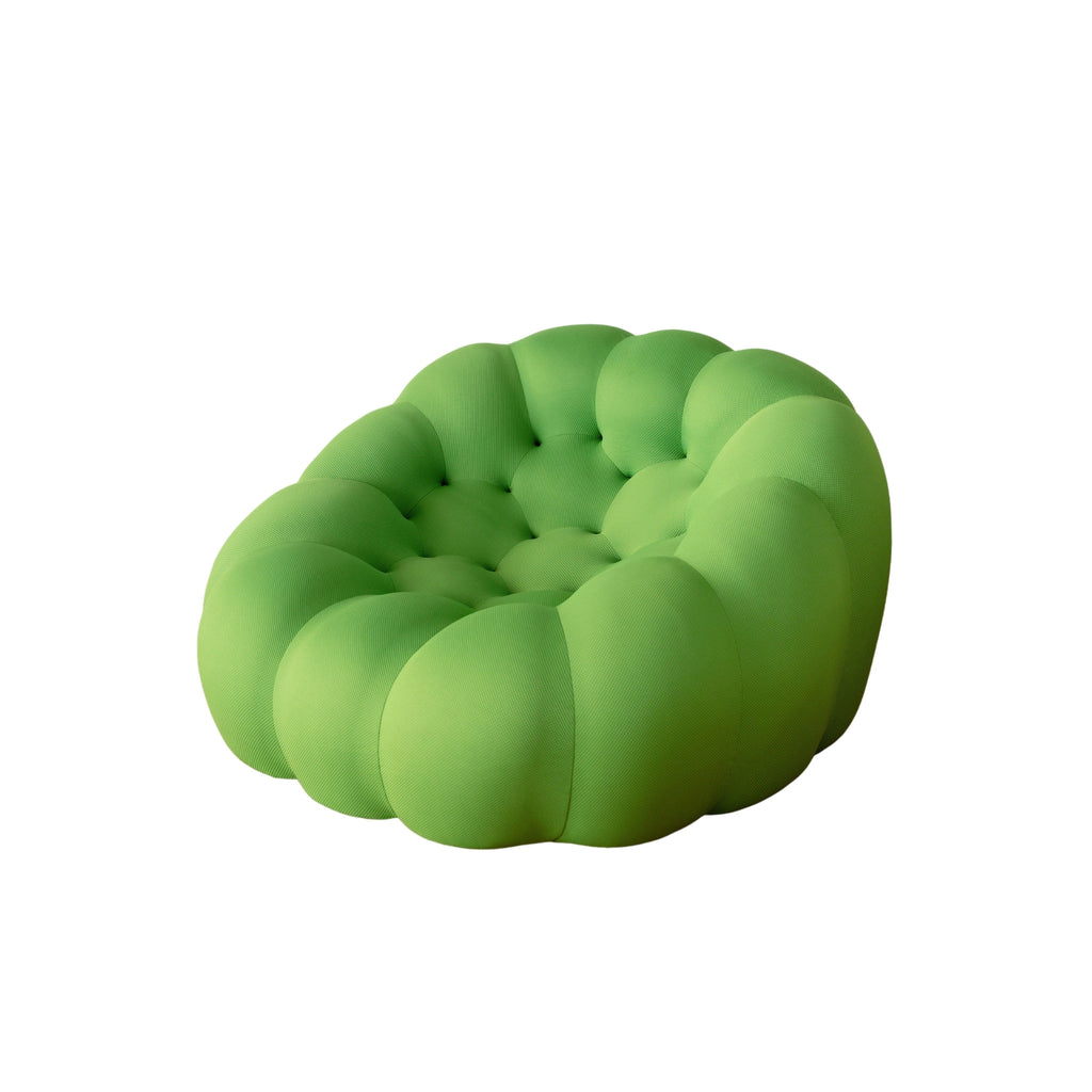 A bold, modern armchair with a bubble-like form, upholstered in vibrant lime green mesh polyester fabric.