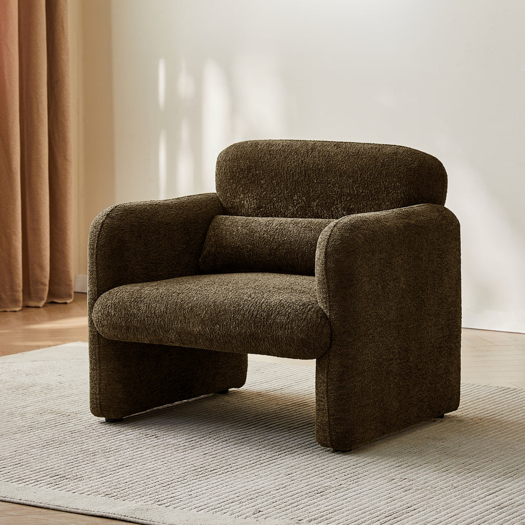 Brown armchair in a room with beige curtains and a light-colored floor.