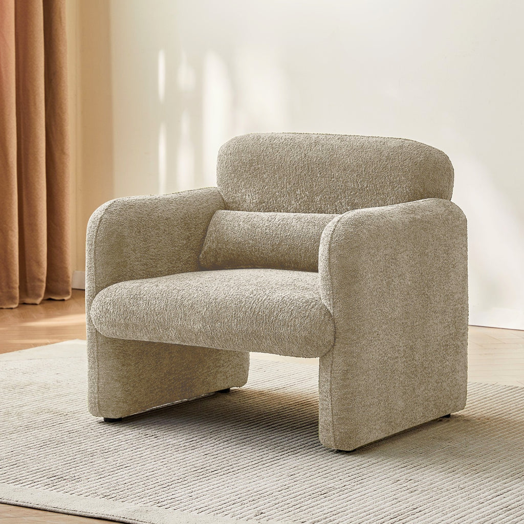 Beige armchair in a room with a neutral colour scheme