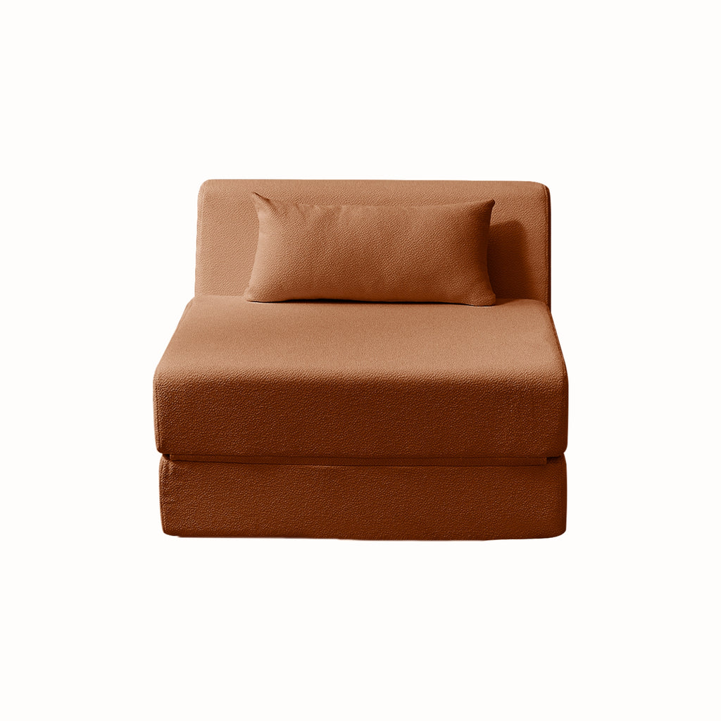 Terracotta sofa chair with a pillow on a white background