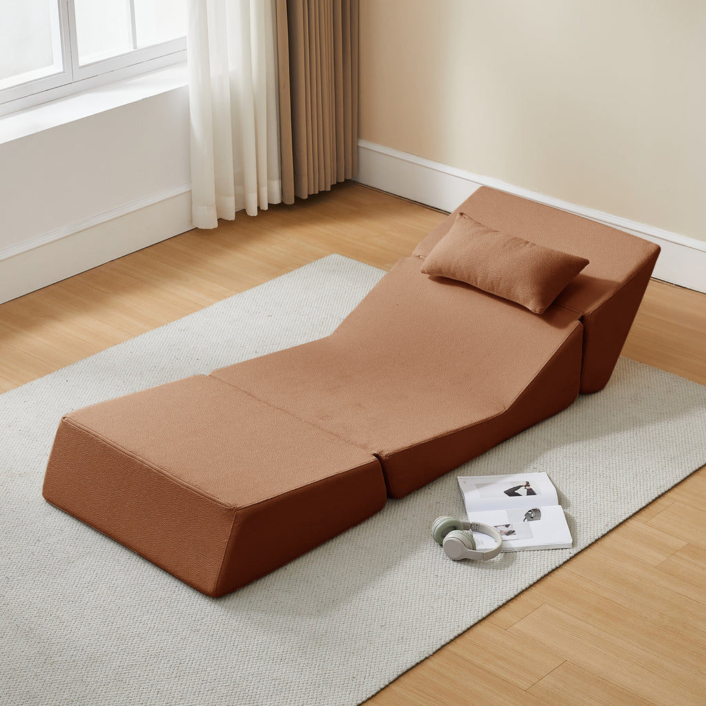 Terracotta sectional sofa in a room with wooden flooring and a window.
