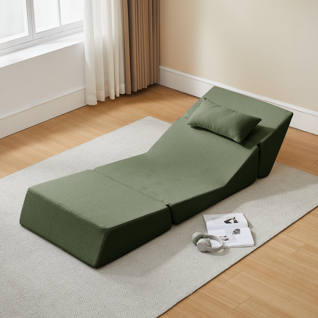 Turtle green folding bed in a room with a wooden floor and a window