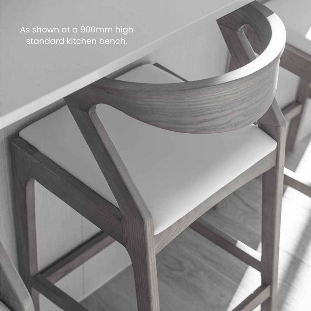 A walnut timber bar stool 900mm high standard kitchen bench