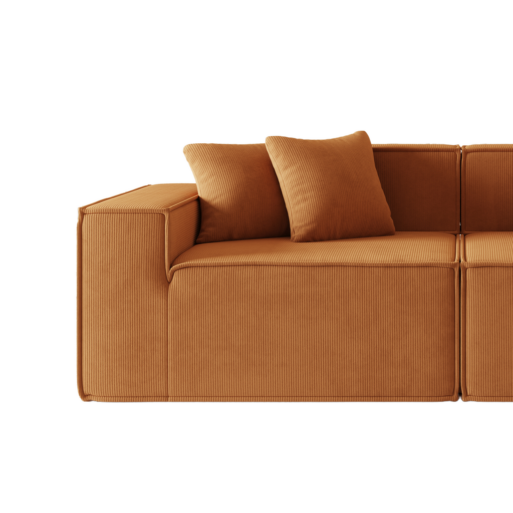 Tribeca two-seater corduroy sofa, featuring a modern, low-profile design with plush cushions
