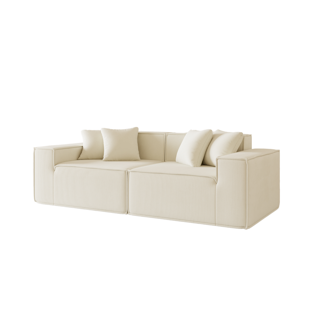 A milk Tribeca two-seater corduroy sofa with plush cushions and a contemporary design.
